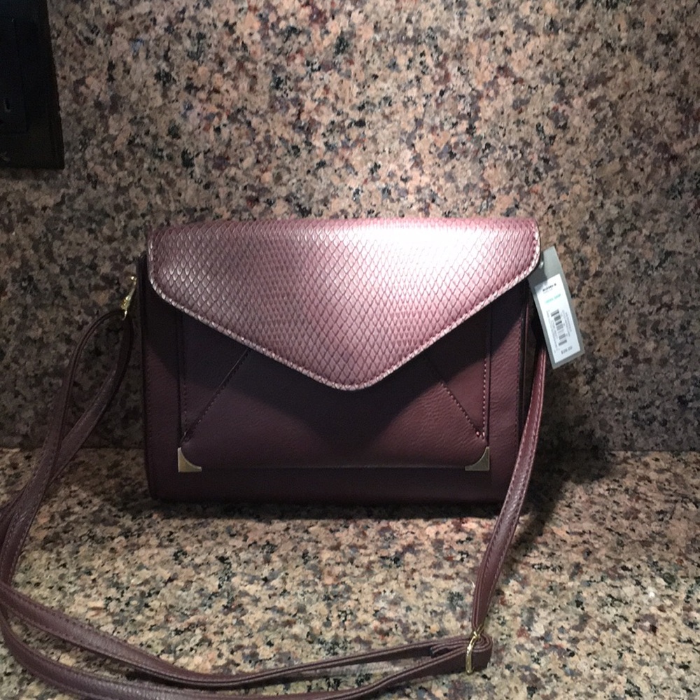 Apt. 9. 
Deep burgundy crossbody pocketbook